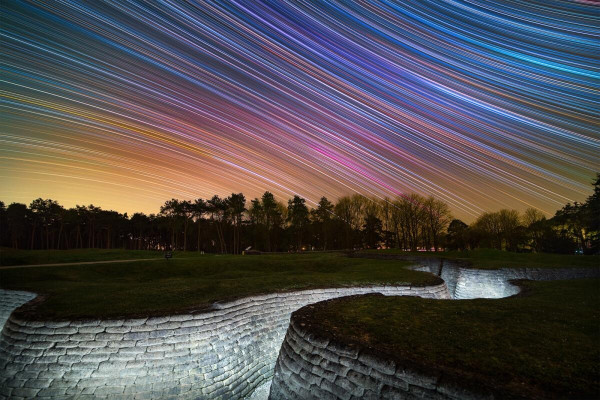Celestial Equator Above First World War Trench Memorial by Louis Leroux-Gere

Vimy, Pas-de-Calais, France

Louis says, "This is my first star trail taken over a five-hour exposure. This photograph was captured at the Canadian National Vimy Memorial in northern France, the site to remember all Canadians who served in the First World War. I slept in those trenches while my camera captured the rotation of the sky and was absolutely amazed by the stars."