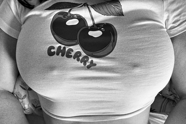 Laying on my back in my rather snug white t-shirt which has two cherries with CHERRY text underneath. It would appear the room is cold or I’m in a state of arousal but my nipples are just designed that way.